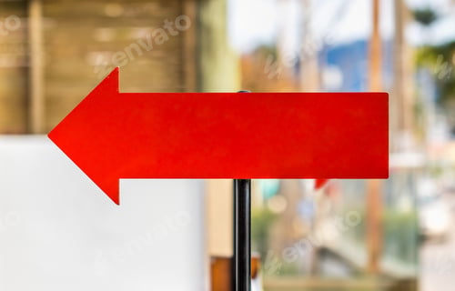 Preview: Closeup shot of a red arrow pointing left