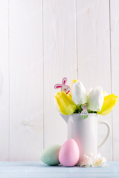Preview: Congratulation Easter card with fresh tulips, handmade painted eggs and decotation against light
