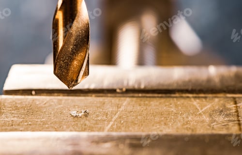 Preview: Drill close-up at the workplace in workshop