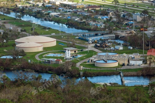 Preview: Aerial view of water treatment factory at city wastewater cleaning facility.