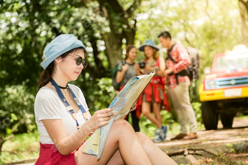 Preview: Couple or friends navigating together smiling happy during camping travel hike outdoors.