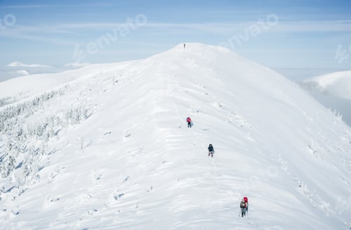 Preview: Scenic View of Winter Carpathian Gorgany Mountains and Determined Climbers