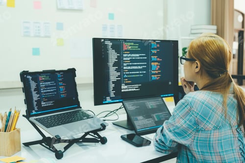 Preview: Programmer is coding and programming software.
