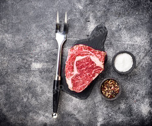 Preview: Raw marbled ribeye steak and spices