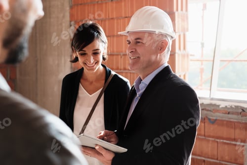 Preview: Sales Agent Showing New House To Husband And Wife