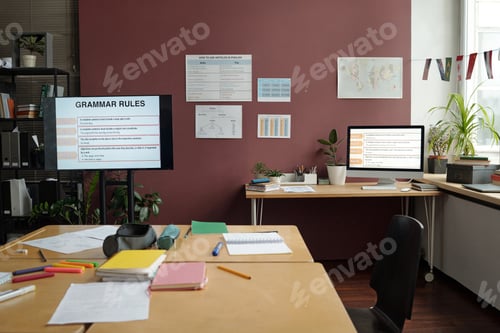 Preview: Posters, board and table in classroom
