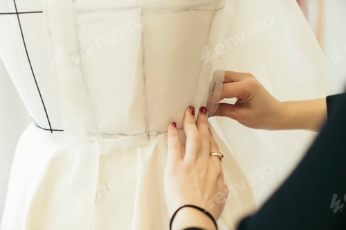 Preview: Fashion designer's hands at work
