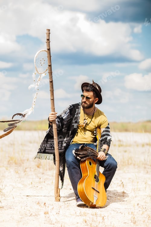 Preview: Man as boho hipster against blue sky