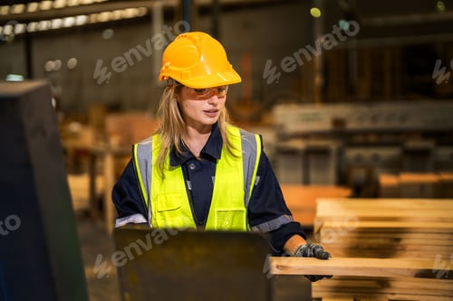 Preview: Warehouse worker folding paper box for packing the items