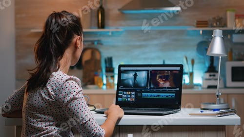 Preview: Video editor working from home at night