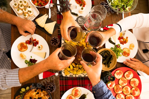 Preview: above and top view in a big table full of food like chicken and more at dinner or lunch