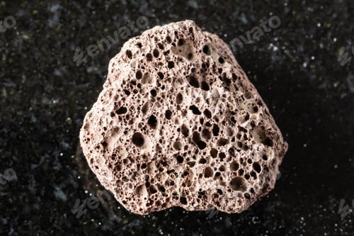 Preview: sample of rough brown pumice mineral on black