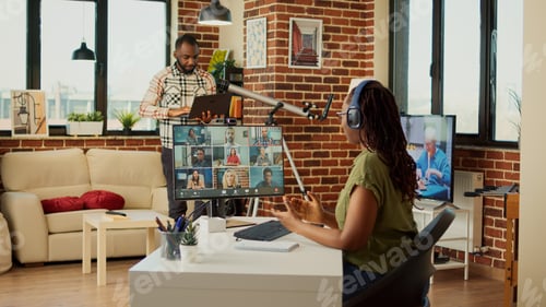 Preview: Office worker attending company meeting on videocall