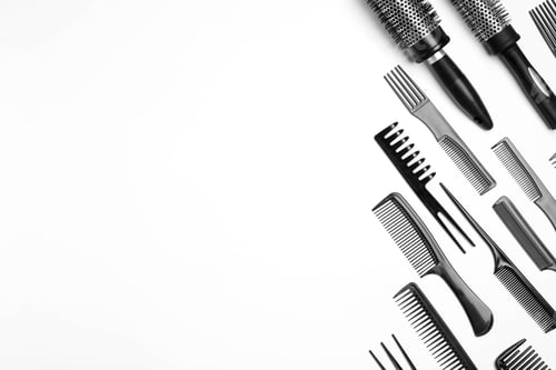 Preview: Composition with hair combs and brushes on white background, top view