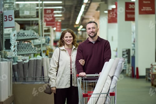 Preview: Young Adult Couple Shopping Together in Home Improvement Store