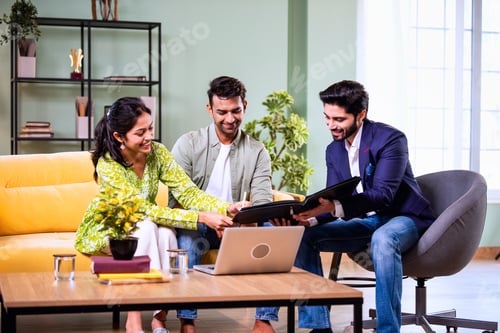 Preview: Indian family investment consultation at home with professional agent reviewing paperwork