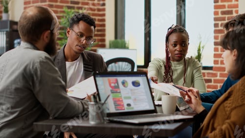 Preview: Diverse team of coworkers analyzing research information