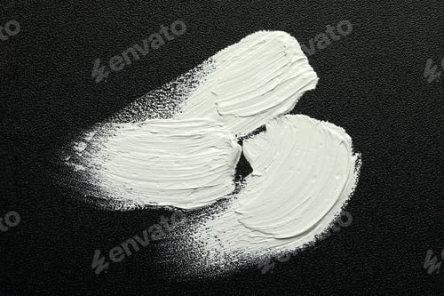 Preview: Strokes of white oil paint on black canvas, top view