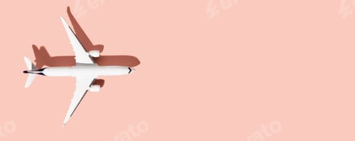 Preview: Miniature white airplane on a pink background