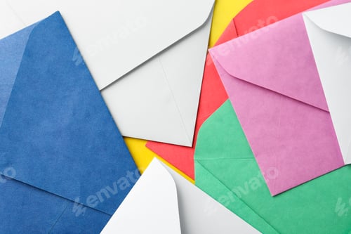 Preview: Colorful paper envelopes as background, top view