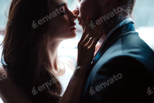 Preview: Affectionate Young Couple Embrace in Tender Moment