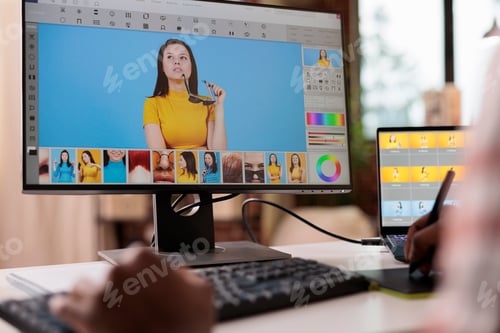 Preview: Retouching artist editing picture with retoucher software