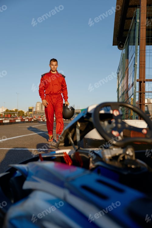 Preview: Race Car Driver Walking on the Track