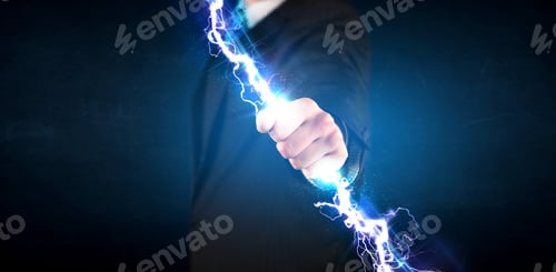 Preview: Business Man Holding Electricity Light Bolt In His Hands Concept