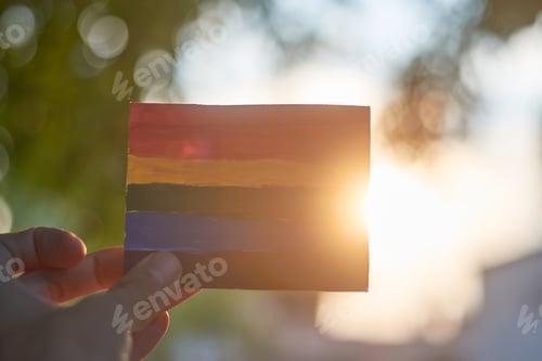 Preview: LGBT Pride flag, with sunlight on the back.
