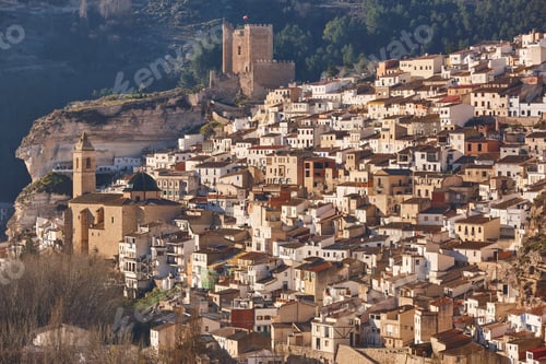 Preview: Picturesque white village on the mountain. Alcala del Jucar. Spain