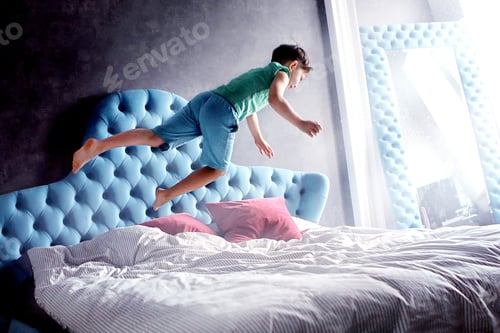 Preview: jumping boy flying over the bed