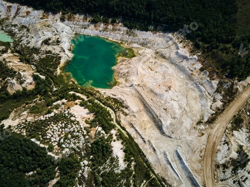 Preview: Aerial view quarry extraction porcelain clay, kaolin, with turquoise water