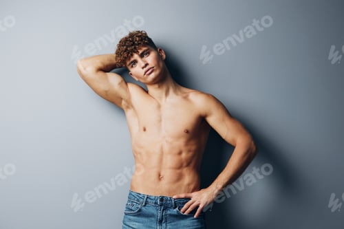 Preview: man strong torso standing young jeans adult fit curly body