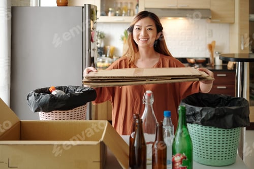 Preview: Woman sorting cardboard, glass and plastic