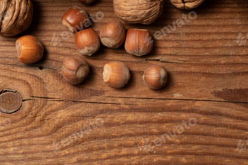 Preview: nuts on wooden table