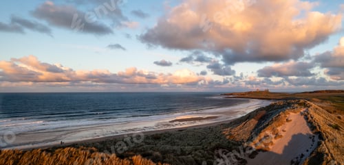 Preview: Aerial panorama view of Embleton Bay and Dunstanburgh along the wild Northumberland coast