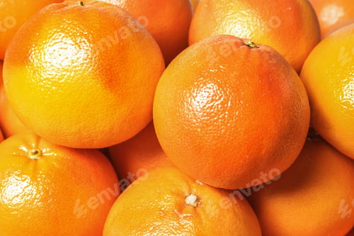 Preview: Many whole fresh ripe grapefruits as background, closeup