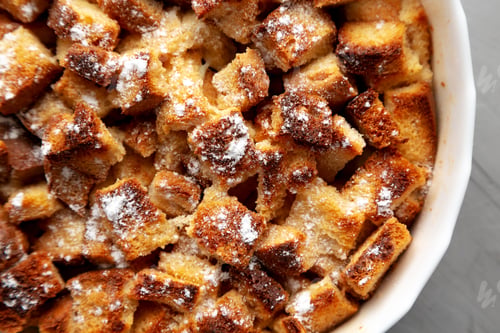 Preview: Homemade Bread Pudding in a Dish, top view. Flat lay, overhead, from above. Close-up.