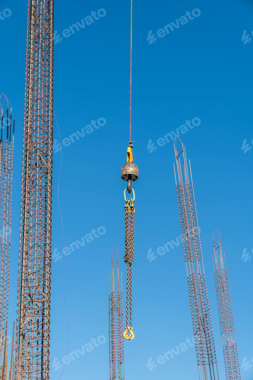 Preview: Jib crane boom crane arm against blue sky background at construction zone