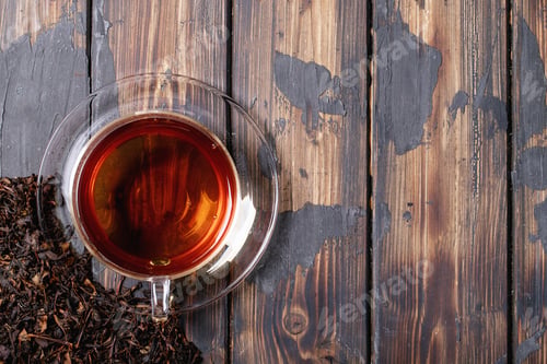 Clear Cup of Tea on Distressed Wood