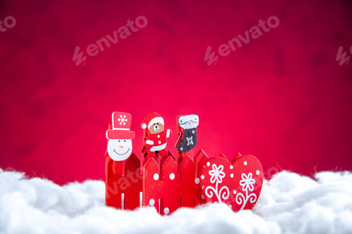 Preview: front view mini xmas toy on red background with free space