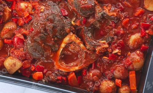 Preview: ossobuco stew with vegetables, knuckle on the bone with new potatoes, in tomato sauce,homemade,