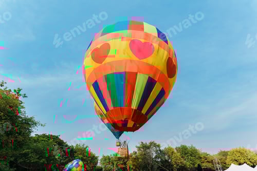 Preview: Colorful hot air balloon floating in blue sky