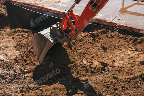 Preview: Excavator shovel digging on dirt