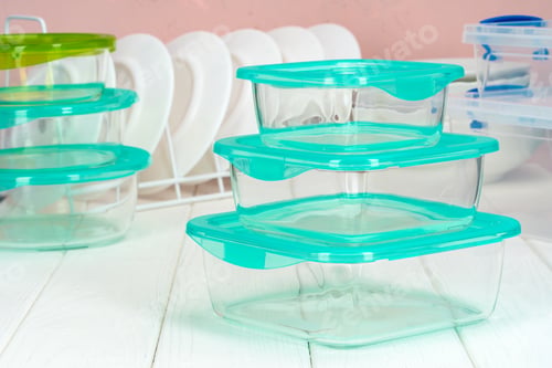 Preview: Clean kitchen with various plates and food boxes