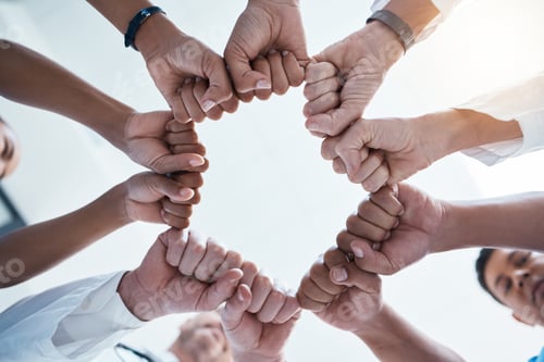 Preview: Corporate diversity, teamwork and fist in circle of group of business employees at office team buil
