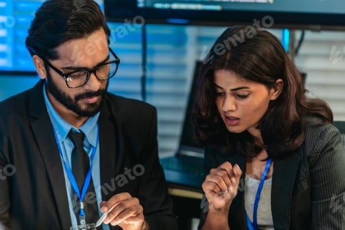 Software Developers Discussing Code