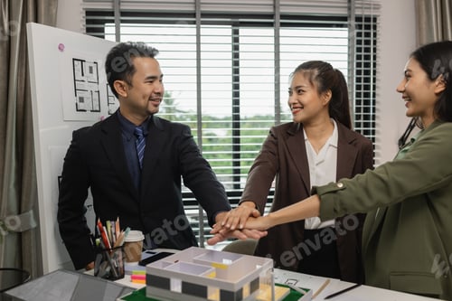 Preview: a group of architects congratulate each other after the work is successfully completed, founders of