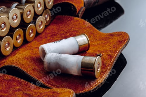 Preview: Pouch full of rifle cartridges on black backgorund