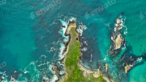 Preview: Beautiful overhead aerial shot of coral reefs in the middle of the ocean with amazing ocean waves